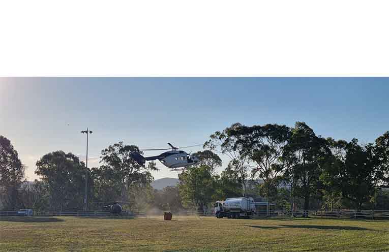 Recon and water-bombing aircraft land, refuel and take off from Bulahdelah Showground. Photo: Thomas O’Keefe.