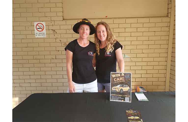 Deb Sheeley and Trish Banyer selling tickets for the raffle.