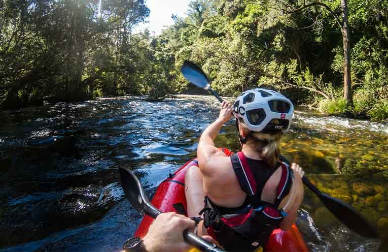 Kayaking in the Barrington River. Photo: NPWS.