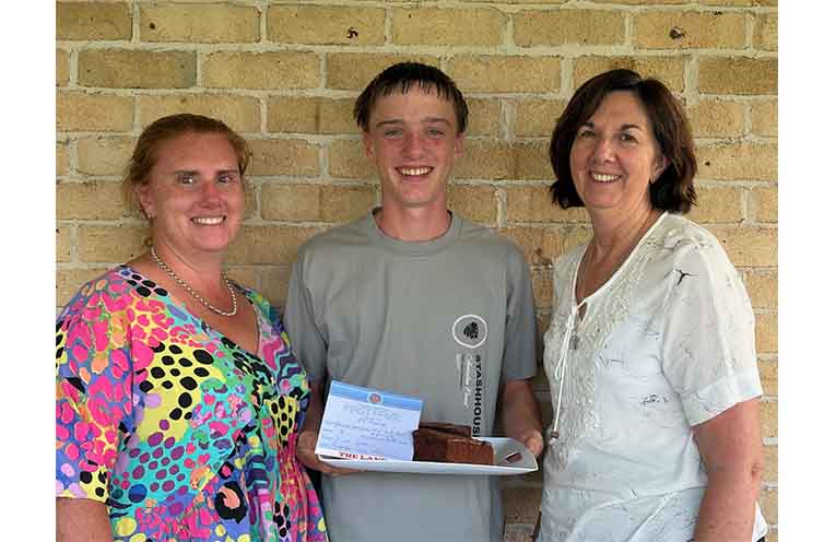 Katherine Stuckings, Eli Stuckings and Jenny Wilson with Eli’s award-winning chocolate cake. Photo: Barbara Reichert.