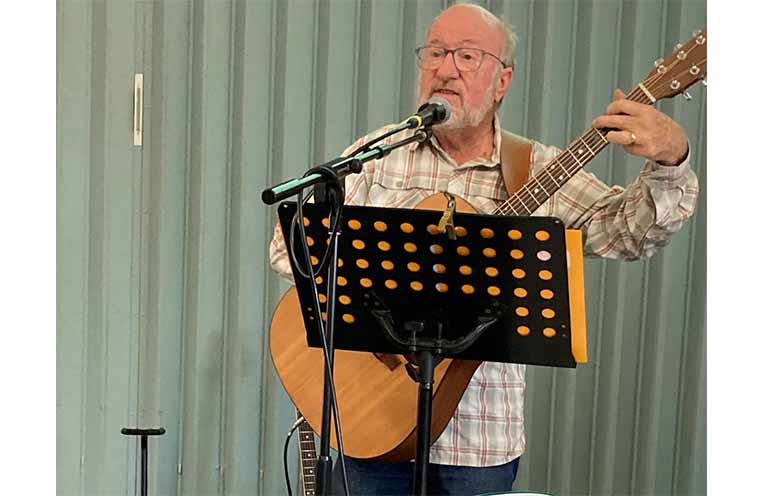 “What year was this song written?” asks Norm Harwood.