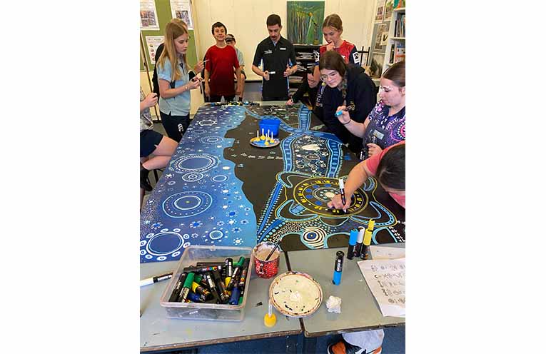 Students finishing their major artwork.