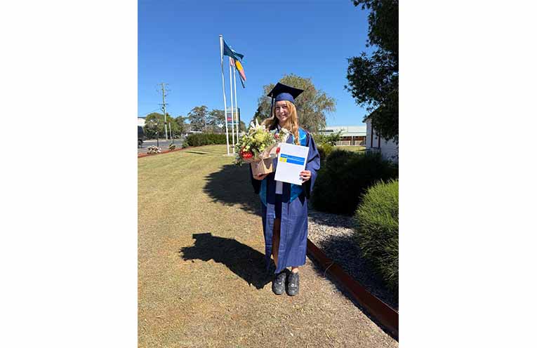 Kymani Tarr celebrates her Gloucester High School graduation after placing third in Year 12 and receiving the Ampol Best All Rounder Award. Photo: Supplied.